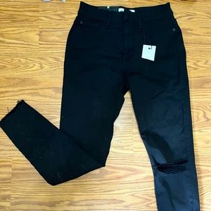 Black ripped cut off pants